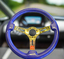 AVENUE PLUM CRAZY PURPLE/ GOLD SPOKES AS-IS STEERING WHEEL (1 OF 3)