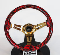 AVENUE RED SKULLS/ GOLD SPOKES HYDRO DIPPED STEERING WHEEL (LIMITED EDITION)