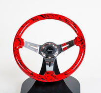 AVENUE RED/ BLACK SPLATTER/ CHROME SPOKES STEERING WHEEL (ONE-OFF)