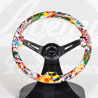 AVENUE STICKERBOMB/ BLACK SPOKES HYDRO DIPPED STEERING WHEEL