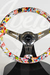 AVENUE STICKERBOMB/ CHROME SPOKES HYDRO DIPPED STEERING WHEEL
