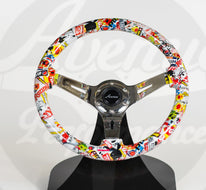 AVENUE STICKERBOMB/ CHROME SPOKES HYDRO DIPPED STEERING WHEEL