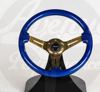 AVENUE DAYTONA BLUE W/ GOLD SPOKES STEERING WHEEL