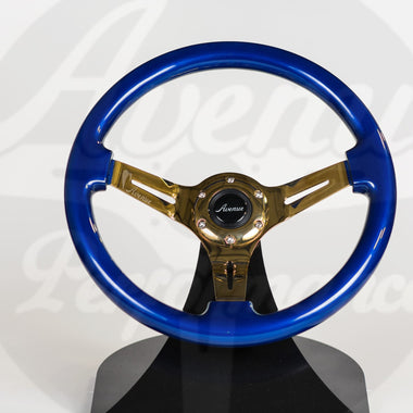AVENUE DAYTONA BLUE W/ GOLD SPOKES STEERING WHEEL