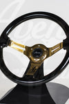 AVENUE RAVEN BLACK W/ GOLD SPOKES STEERING WHEEL