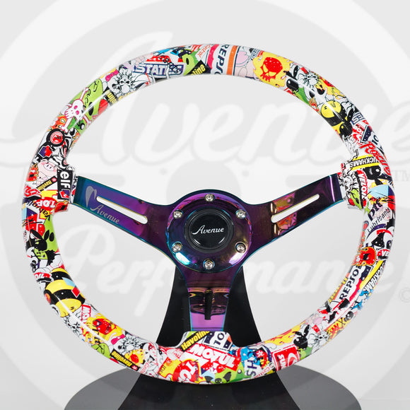 AVENUE STICKERBOMB/ NEOCHROME SPOKES HYDRO DIPPED STEERING WHEEL